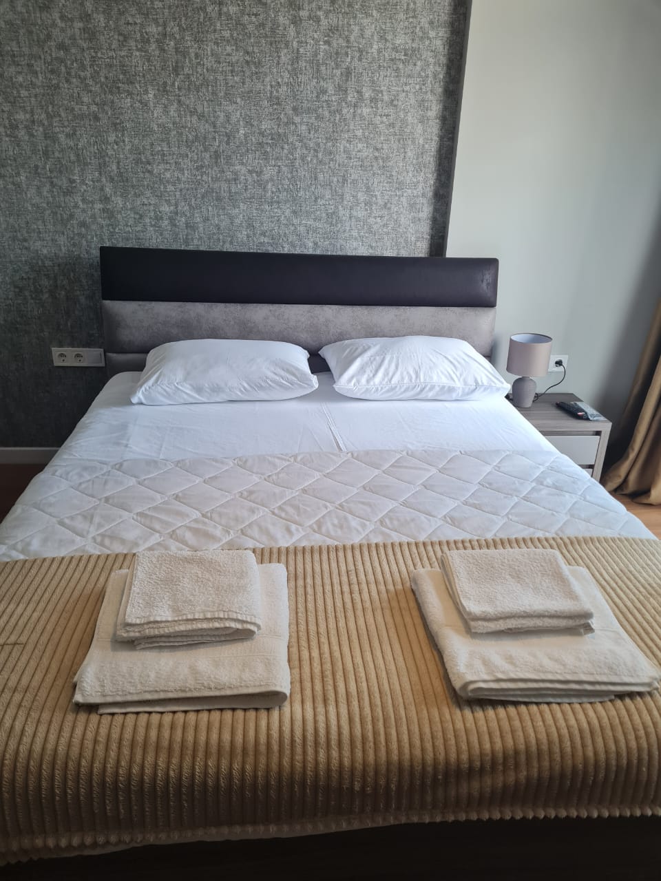 White Sails Batumi 6th floor apartment — stylish bedroom with natural light, apartment for sale on Black Sea coast